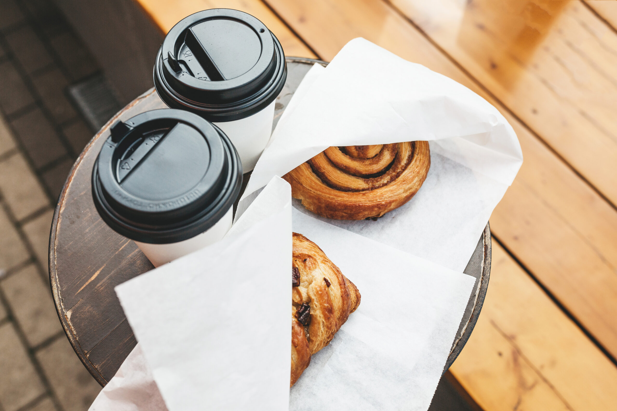 to-go coffee and breakfast pastries