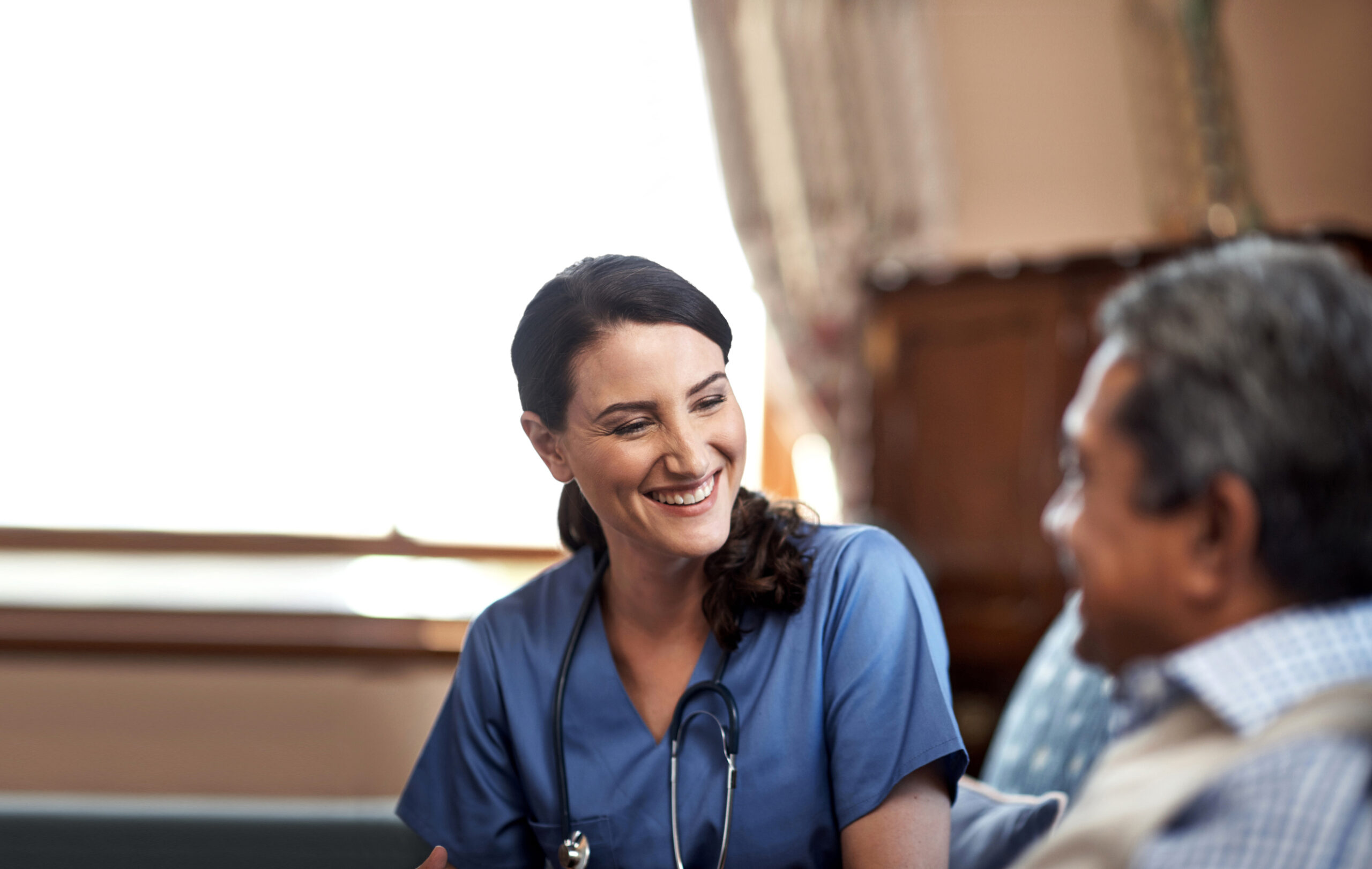a senior man consulting with his physician
